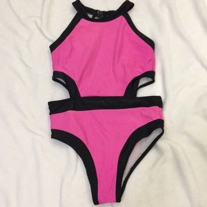 Pink and black one piece bathing suit